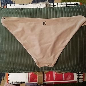 Hurley bikini bottom size small color tan.
